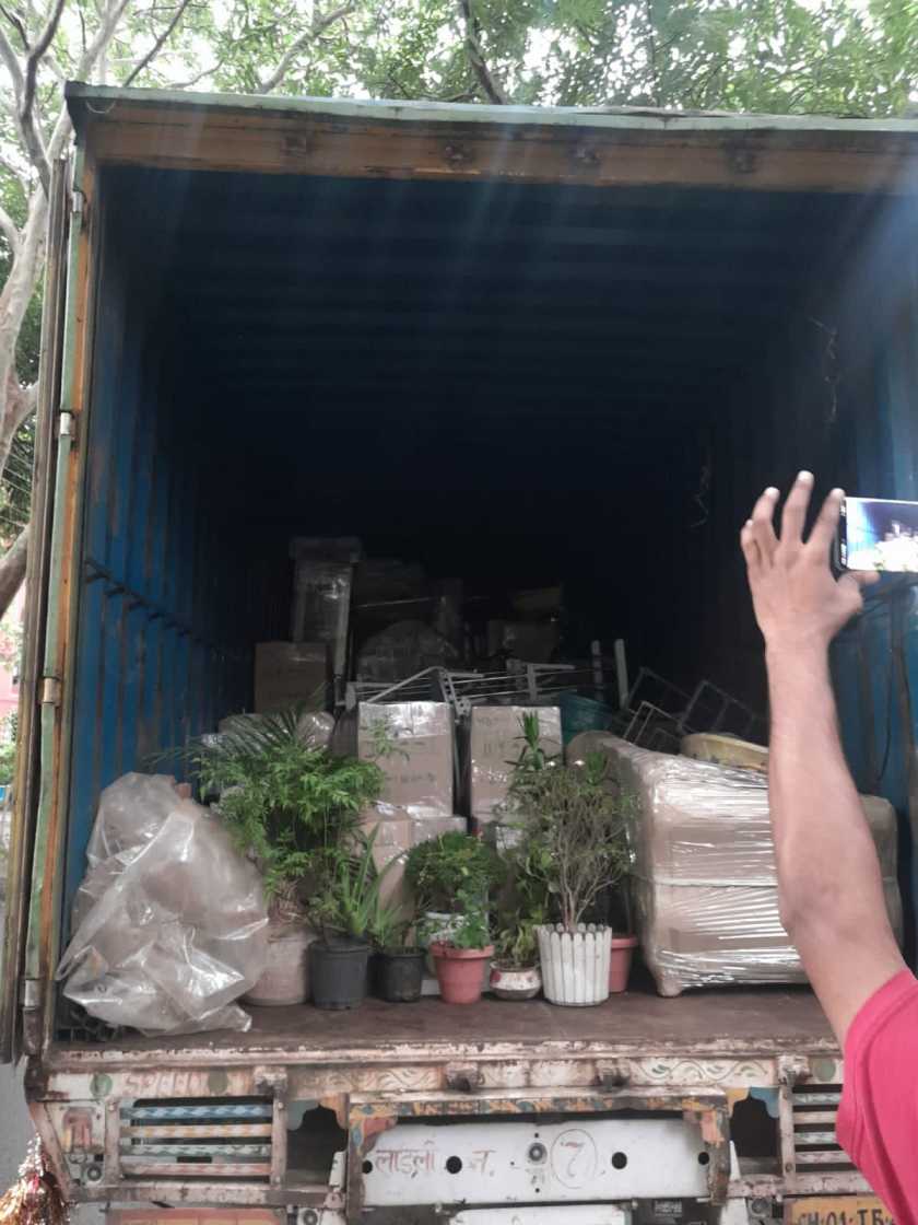 Packers and Movers Household Goods Loading in Truck for Chennai to Delhi Move - Live Potted Plants, Wrapped Furniture & Digital Verification