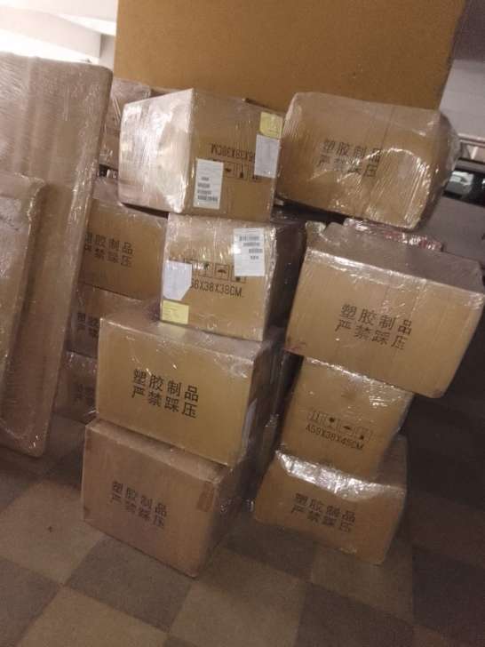 Moisture-proof stretch wrapped cartons and barcode tagged household items ready for Chennai to Pondicherry shifting